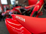 2023 HONDA CRF50F - EXTREME RED