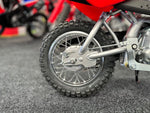 2023 HONDA CRF50F - EXTREME RED