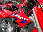 2023 HONDA CRF50F - EXTREME RED